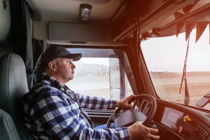 a man driving a semi